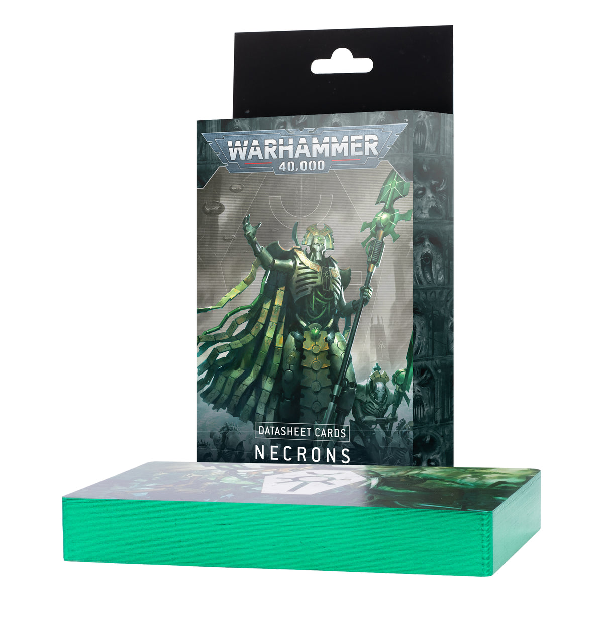 A thick stack of green-edged Necrons datasheet cards sits in front of an upright black-backed package. The front shows a skeletal armored figure holding a staff and the text “WARHAMMER 40,000,” “DATASHEET CARDS,” and “NECRONS.”