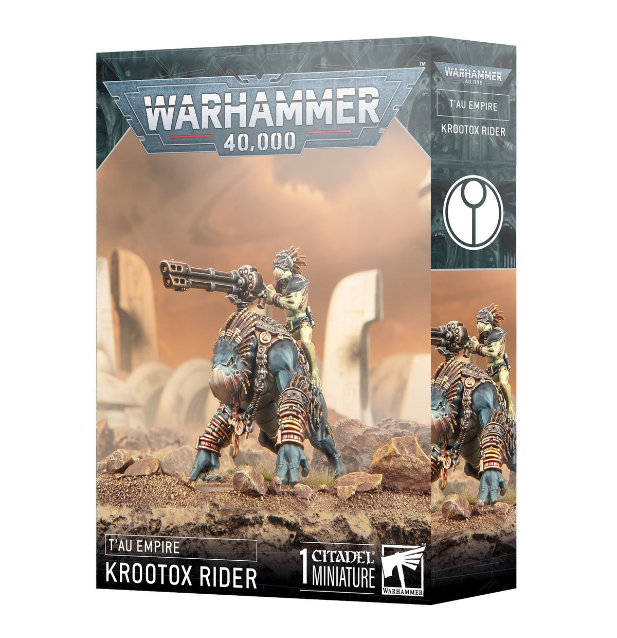 Angled Warhammer 40,000 box showing artwork of a green-skinned rider on a blue-gray, armored Krootox carrying a large gun. The front reads “T’AU EMPIRE” and “KROOTOX RIDER”; the side panel repeats the artwork and shows a circular emblem.
