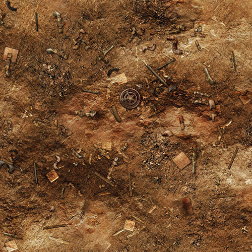Overhead view of the Junkyard gaming mat, printed with a mottled rust-brown and dusty ground pattern scattered with scrap metal, pipes, and debris. A small circular target-like marking sits near the center; no text is visible.