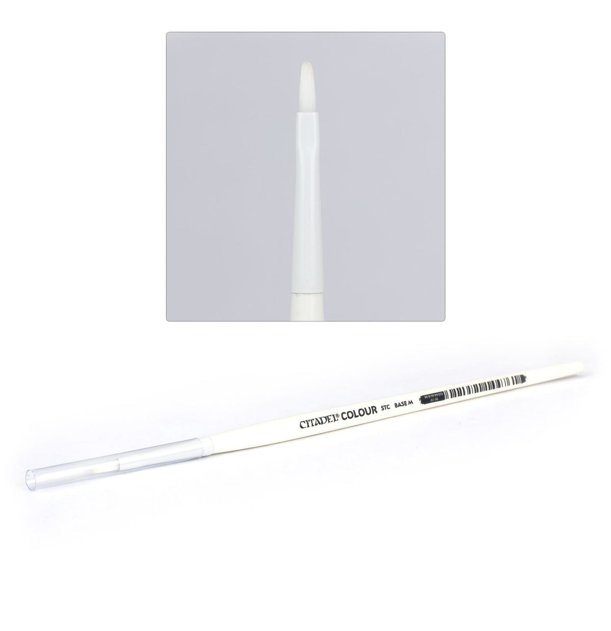 A white Citadel brush lies diagonally with a clear protective cap over its handle end and gray lettering reading “CITADEL COLOUR” and “STC BASE M” beside a barcode. An inset close-up shows its short, rounded white bristles.