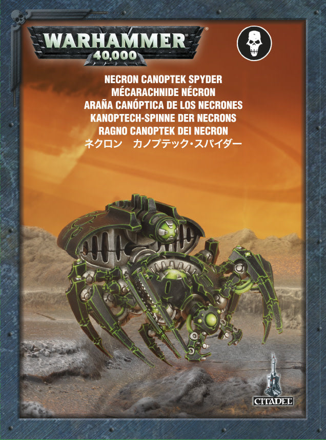 Front of a Warhammer 40,000 box featuring a black and metallic spider-like Necron miniature with bright green details against an orange desert scene. The packaging reads “WARHAMMER 40,000” and “NECRON CANOPTEK SPYDER.”