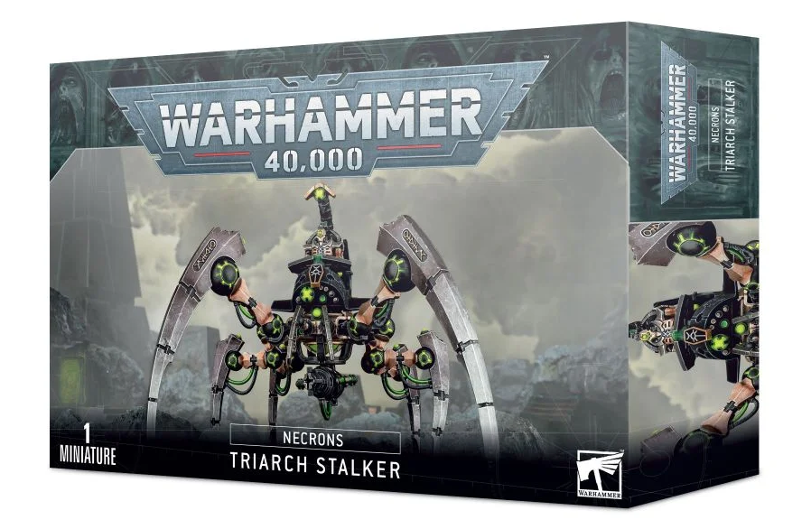 Box for a Necrons Triarch Stalker miniature, shown from the front and right side. The artwork features a dark metallic, many-legged machine with bright green details; the box reads “WARHAMMER 40,000” and “TRIARCH STALKER.”