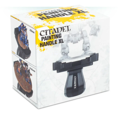 White box with yellow splashes showing a black Citadel painting handle with a wide clamp. Side panels show painted miniatures on round bases, and the front reads “CITADEL PAINTING HANDLE XL.”