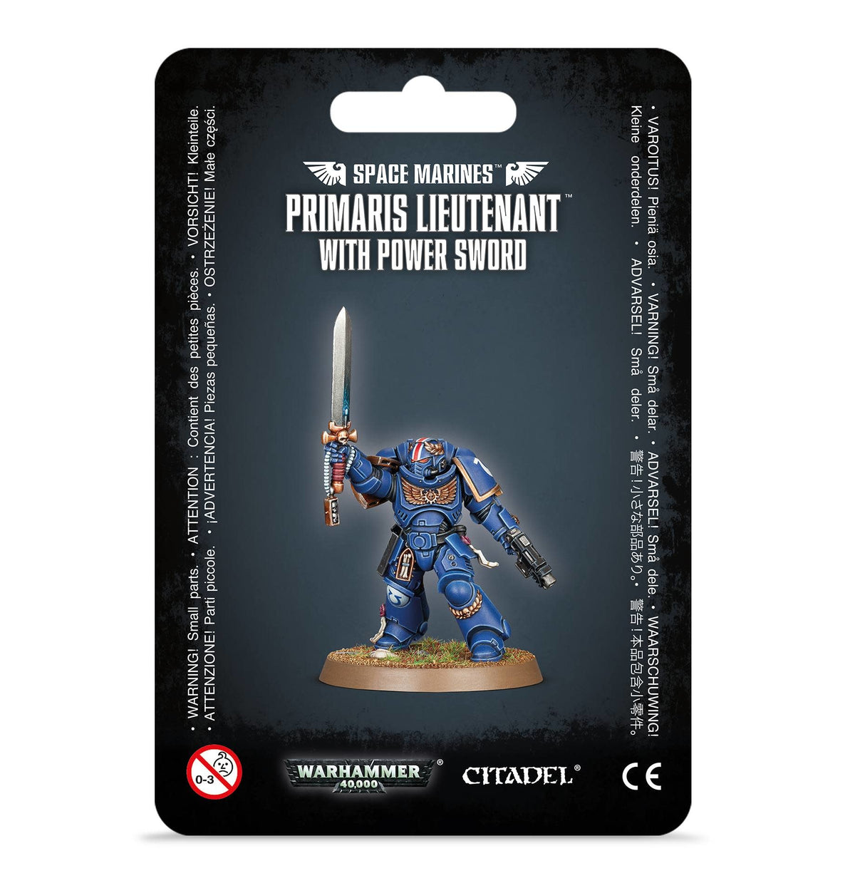 A blue armored Space Marine miniature stands on a round base on dark packaging, raising a long silver sword and holding a firearm. The card reads “SPACE MARINES” and “PRIMARIS LIEUTENANT WITH POWER SWORD,” with Warhammer 40,000 and Citadel logos below.