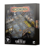 Box for the Necromunda: Zone Mortalis Floor Tile Set, with artwork of a gray industrial metal floor made of square panels, pipes, hazard stripes and miniature figures. The front reads “NECROMUNDA” and “ZONE MORTALIS FLOOR TILE SET”; the narrow side repeats the set name.
