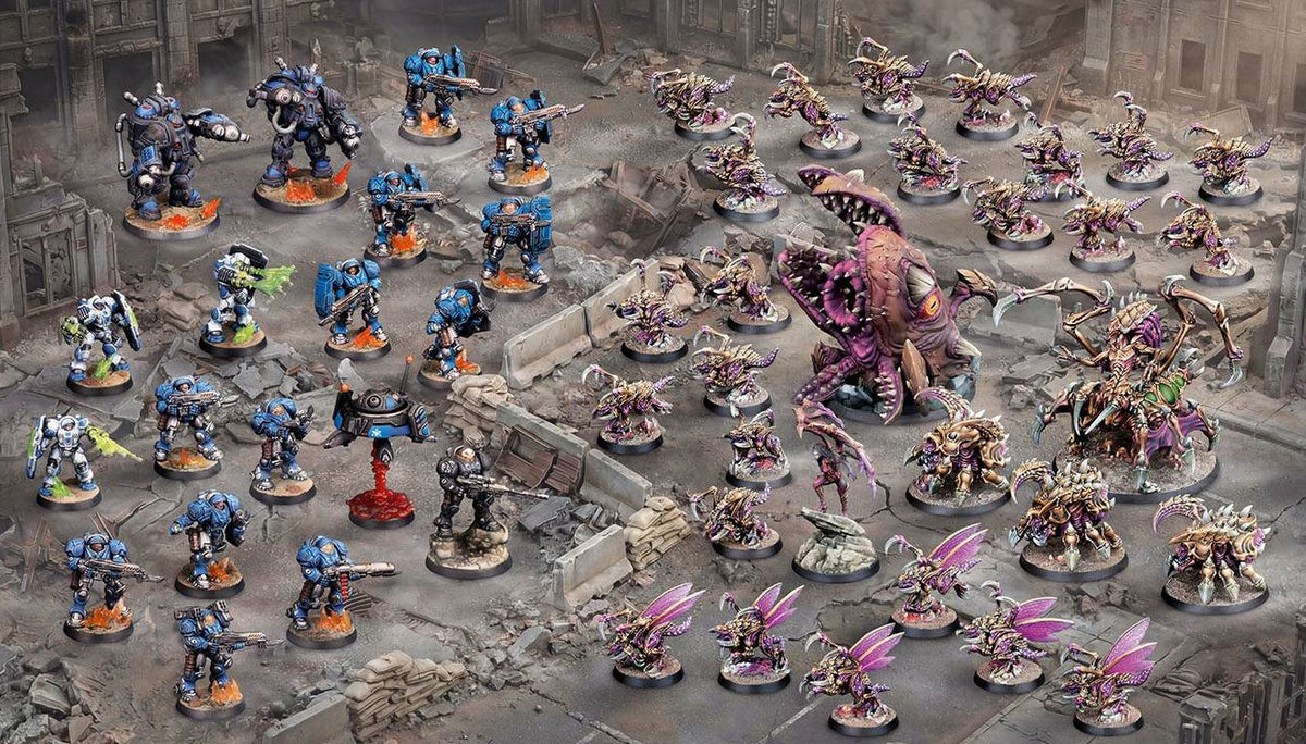 StarCraft Tabletop Miniatures Game Terran and Zerg miniatures battling across a ruined city