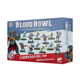 Blue, white and red Blood Bowl team box shown from the front and right side, with artwork of blue and red reptilian football miniatures in varied poses. The box reads “BLOOD BOWL,” “LIZARDMEN BLOOD BOWL TEAM” and “GWAKA'MOLI CRATER GATORS.”
