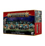 Box for Seraphon Saurus Warriors miniatures, shown at an angle with the front and right side visible. Red, navy and gold packaging depicts blue-green reptilian warriors carrying weapons; the front reads “WARHAMMER AGE OF SIGMAR” and “SAURUS WARRIORS.”