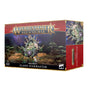 Box for the Seraphon Slann Starmaster miniature, shown from the front and right side. The front depicts a green amphibian seated on an ornate floating throne against a jungle and starry backdrop, with the text “WARHAMMER AGE OF SIGMAR” and “SERAPHON SLANN STARMASTER”; the side repeats the character artwork.