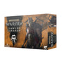 Orange-brown Warcry miniature box shown from the front and right side, with dark fantasy artwork of armored figures and a white skull-like emblem. The front reads “WARHAMMER AGE OF SIGMAR,” “WARCRY,” “CLAWS OF KARANAK” and “8 MINIATURES.”