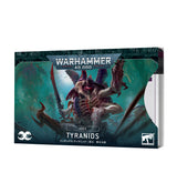 A horizontal stack of Tyranids index cards shown from the front, with a dark teal cover depicting a multi-limbed alien creature. The cover reads “WARHAMMER 40,000,” “INDEX” and “TYRANIDS,” with a white Warhammer logo at the lower right and card edges visible along the side.