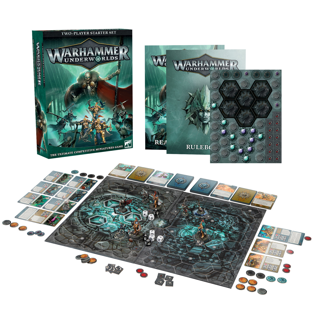 Warhammer Underworlds starter set displayed with its illustrated two-player box, rulebooks, token sheet, cards, dice and miniature figures. The dark teal and black hex-patterned game board is spread out below; the box reads “TWO-PLAYER STARTER SET.”