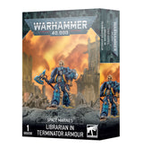 Box for a Space Marines Librarian in Terminator Armour miniature, shown from the front and right side. The artwork features a blue-and-gold armored figure with an axe against a fiery ruined city; the front reads “WARHAMMER 40,000” and “LIBRARIAN IN TERMINATOR ARMOUR.”