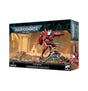 Warhammer 40,000 Commander Farsight miniature box, shown from the front and right side. The front depicts a red armored sci-fi figure holding a blade on rocky ground; the box reads “WARHAMMER 40,000” and “T’AU EMPIRE COMMANDER FARSIGHT.”