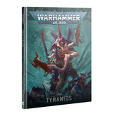 Front cover of the Codex: Tyranids book, shown upright at a slight angle. Teal and dark gray cover art depicts a large, pale pink and purple Tyranid creature wielding a blade among smaller creatures; the cover reads “WARHAMMER 40,000” and “CODEX TYRANIDS.”