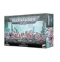 Angled view of a Warhammer 40,000 Termagants miniatures box, showing the front and right side. The box art depicts a swarm of pale, pink-accented alien creatures; the front reads “WARHAMMER 40,000,” “TYRANIDS” and “TERMAGANTS.”