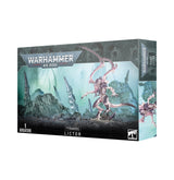 Box for a Tyranids Lictor miniature, shown from the front and right side. The artwork depicts a pinkish, many-limbed alien with curved scythe-like appendages in a rocky blue-green landscape; the front reads “WARHAMMER 40,000” and “TYRANIDS LICTOR.”