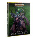 A hardcover fantasy book with a green cover shows a hulking purple giant carrying smaller figures, with curved horns and dark armor. The cover reads “WARHAMMER AGE OF SIGMAR,” “DAWNBRINGERS,” and “REIGN OF THE BRUTE”; the spine also reads “REIGN OF THE BRUTE.”