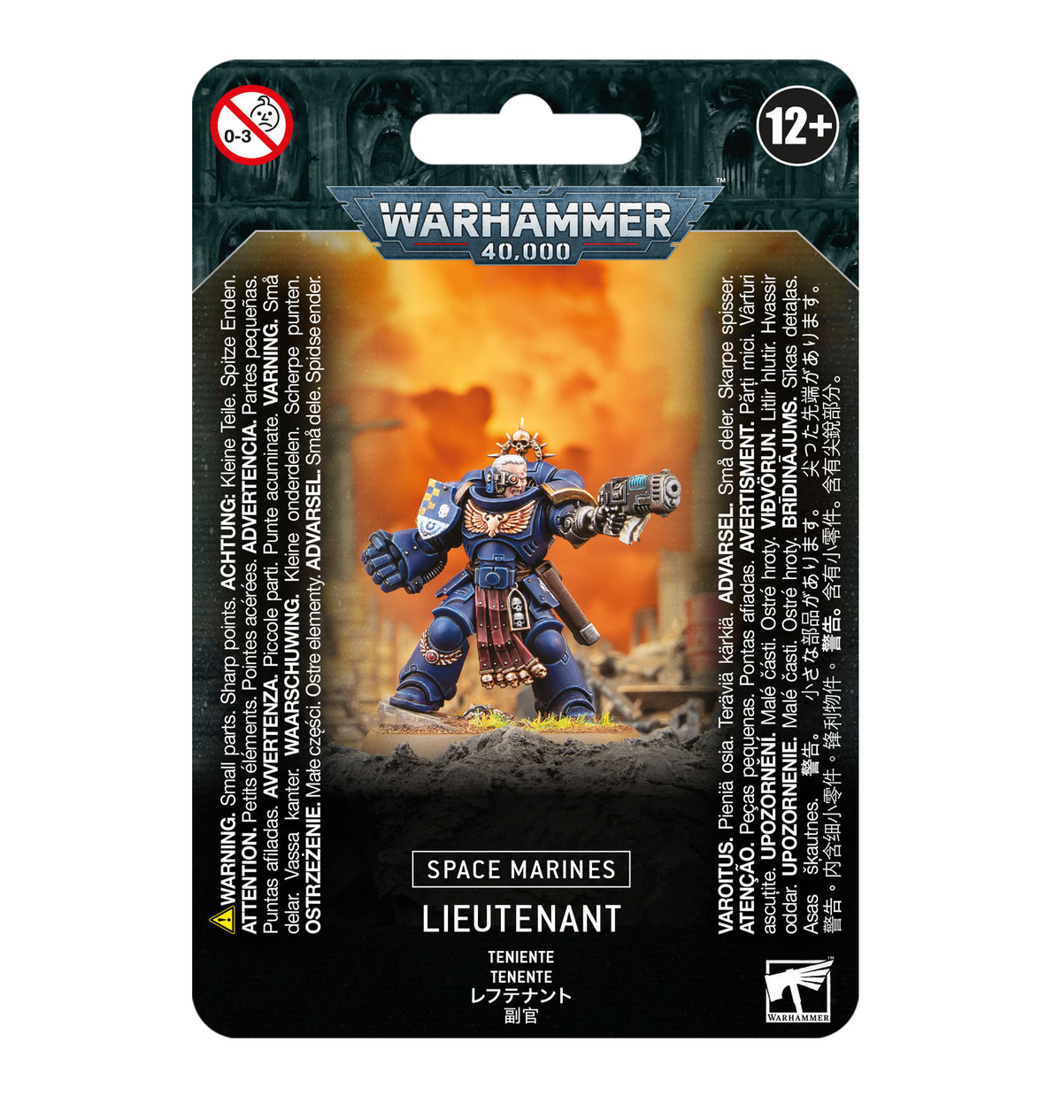 Front of a black card package for a Space Marines Lieutenant miniature, showing a blue-armored figure holding a large firearm against an orange, smoky background. The package reads “WARHAMMER 40,000” and “SPACE MARINES LIEUTENANT,” with 12+ and 0–3 warning symbols.