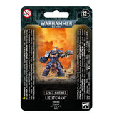 Front of a black card package for a Space Marines Lieutenant miniature, showing a blue-armored figure holding a large firearm against an orange, smoky background. The package reads “WARHAMMER 40,000” and “SPACE MARINES LIEUTENANT,” with 12+ and 0–3 warning symbols.