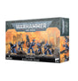 Box for a Space Marines: Desolation Squad miniature set, shown from the front and right side. The front depicts five blue-armored soldiers with large weapons against an orange ruined-city scene, with text reading “WARHAMMER 40,000” and “DESOLATION SQUAD.”