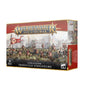 Red, white and gold Warhammer Age of Sigmar box showing armored soldiers with shields and a red banner across the front, with a narrow illustrated side panel. The box reads “WARHAMMER AGE OF SIGMAR” and “CITIES OF SIGMAR FREEGUILD STEELHELMS.”