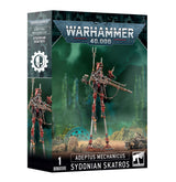 Box for a Sydonian Skatros miniature, showing a red-and-metallic cybernetic figure with a long rifle on towering stilts against a green battlefield scene; a narrow side panel repeats the figure. The front reads “WARHAMMER 40,000” and “SYDONIAN SKATROS.”