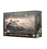 Legions Imperialis Kratos Heavy Tank Squadron box, shown at an angle with the front and right side visible. Dark gray packaging depicts armored tanks in a dusty battlefield scene and reads “LEGIONS IMPERIALIS” and “KRATOS HEAVY TANK SQUADRON,” with an “x4 EPIC SCALE” badge.