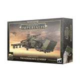 Box for a Legiones Astartes Thunderhawk Gunship miniature, shown at an angle. The front artwork depicts a bulky gray-green aircraft flying through a sunset sky; visible text reads “WARHAMMER” and “LEGIONES ASTARTES THUNDERHAWK GUNSHIP.”