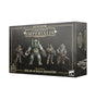 A dark gray game box with gold borders shows four armored Solar Auxilia infantry figures on the front and a partial figure on the side. The front reads “LEGIONS IMPERIALIS” and “SOLAR AUXILIA INFANTRY,” with a “104 MINIATURES” badge.