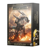 Box for a Warlord Battle Titan miniature, shown from the front and right side. The front depicts a dark, heavily armored titan with large weapons amid flames; the side has a close-up of gold-and-black armor. Text reads “LEGIONS IMPERIALIS” and “WARLORD BATTLE TITAN.”