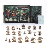 Dark Angels army set displayed with a Deathwing Assault box, booklet, transfer sheet, and multiple miniature warriors in bone-colored armor with green details and red weapons on round bases. The box reads “Deathwing Assault” and “WARHAMMER 40,000”.