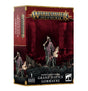 Box for one Flesh-eater Courts Grand Justice Gormayne miniature, shown with its front and left spine. The artwork depicts a skeletal figure in dark robes with a pink, ribbed torso and parchment scrolls; the box reads “WARHAMMER AGE OF SIGMAR” and “GRAND JUSTICE GORMAYNE.”