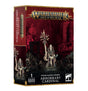 A red, black and gold Games Workshop box shows a pale, skeletal fantasy cleric miniature holding a tall skull-topped staff, with spiked armor and a round base. The front and side panels read “WARHAMMER AGE OF SIGMAR” and “ABHORRANT CARDINAL.”
