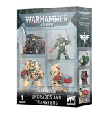Dark gray Warhammer 40,000 box showing green and cream armored Dark Angels figures and close-ups of accessories on the front, with additional detail panels on the side. The box reads “DARK ANGELS” and “UPGRADES AND TRANSFERS.”