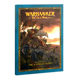 Teal-bound book shown at an angle, with an ornate gold frame around battle artwork of orcs and goblins beneath a fiery sky. The cover reads “WARHAMMER THE OLD WORLD” and “ARCANE JOURNAL ORC & GOBLIN TRIBES.”