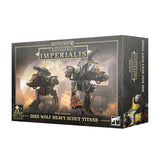 Box for Dire Wolf Heavy Scout Titans, shown from the front and right side. The dark box features artwork of two bulky armored mechanical titans with gold and blue details; prominent text reads “LEGIONS IMPERIALIS” and “DIRE WOLF HEAVY SCOUT TITANS.”