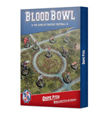 Box for Blood Bowl: Gnome Pitch, with a blue top and side, red lower band, and an illustrated forest football pitch with miniature players. The front reads “BLOOD BOWL,” “THE GAME OF FANTASY FOOTBALL,” and “GNOME PITCH.”