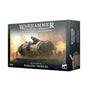Box for the Solar Auxilia Basilisk/Medusa miniature kit, shown from the front and right side. The front depicts a large gray armored artillery tank with a cannon and small soldiers in a dusty battlefield, with the text “WARHAMMER THE HORUS HERESY” and “SOLAR AUXILIA BASILISK / MEDUSA.”