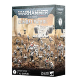 Warhammer 40,000 Combat Patrol box shown at an angle, with the front and right side visible. The front depicts white and gray T’au battlesuits, a hovering transport and infantry on rocky terrain, beneath the text “WARHAMMER 40,000” and “COMBAT PATROL”; the lower panel reads “T’AU EMPIRE.”