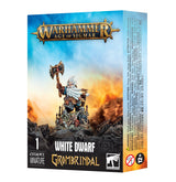 Box for a Citadel miniature, showing a white-haired, long-bearded dwarf in ornate armor raising an axe above rocky ground against a blue and fiery orange background. The front reads “WARHAMMER AGE OF SIGMAR,” “WHITE DWARF” and “GROMBRINDAL”; the narrow right side has warning text and a 12+ symbol.