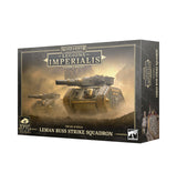 Box for the Leman Russ Strike Squadron, with two olive-drab tanks pictured against a smoky battlefield. The black-and-gold front reads “LEGIONS IMPERIALIS” and “LEMAN RUSS STRIKE SQUADRON,” with an “x8” badge; the narrow side panel shows more artwork and vertical lettering.