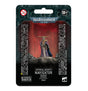 Warhammer 40,000 Imperial Agents Navigator miniature shown on a black and red retail backing card. The figure wears ornate gold details and a purple cloak, standing on a rocky base; the card reads “IMPERIAL AGENTS” and “NAVIGATOR.”