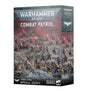 Angled box for Warhammer 40,000: Combat Patrol – Imperial Agents, with a large group of detailed sci-fi miniatures on a rocky battlefield across the front and a dark gray side panel. The box reads “WARHAMMER 40,000,” “COMBAT PATROL,” and “33 CITADEL MINIATURES.”