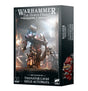 Box for the Thanatar Cavas Siege-Automata kit, with dark artwork showing a bulky bronze and red armored robot amid a battlefield; the side panel shows part of a red machine. Front text reads “WARHAMMER THE HORUS HERESY” and “THANATAR CAVAS SIEGE-AUTOMATA.”