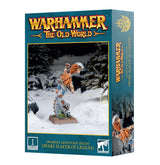 Teal box for a Dwarfen Slayer of Legend miniature, with a painted orange-haired, bearded dwarf raising an axe in a snowy forest scene. The front reads “WARHAMMER THE OLD WORLD” and “DWARFEN MOUNTAIN HOLDS DWARF SLAYER OF LEGEND”; a narrow side panel shows the title and another figure view.