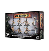 Angled view of a Necromunda miniature box showing its front and right side. The artwork features six pale, spiky alien figures and four floating creatures on black bases, with a monstrous face at the left and the text “NECROMUNDA” and “MALSTRAIN GENESTEALER ABOMINATION GANG.”