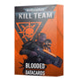 A rectangular orange-and-charcoal Kill Team Blooded datacards box, shown at an angle with its front and right side visible. The front features an armored figure holding a large weapon beneath a skull emblem and the text “WARHAMMER 40,000,” “KILL TEAM,” “BLOODED” and “DATACARDS.”