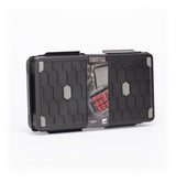 A dark gray rectangular Stormvault Combat Case is shown closed, with raised hexagonal panels, light gray corner accents and matching center emblems. Its central sleeve reads “STORMVAULT COMBAT CASE” above pictures of the bristled interior and red miniatures.