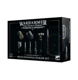 Black Warhammer: The Horus Heresy melee weapons upgrade set box, shown at an angle on a white background. The front displays illustrated sci-fi weapons and the text “LEGIONES ASTARTES” and “MELEE WEAPONS UPGRADE SET”; the narrow side panel repeats the set name.